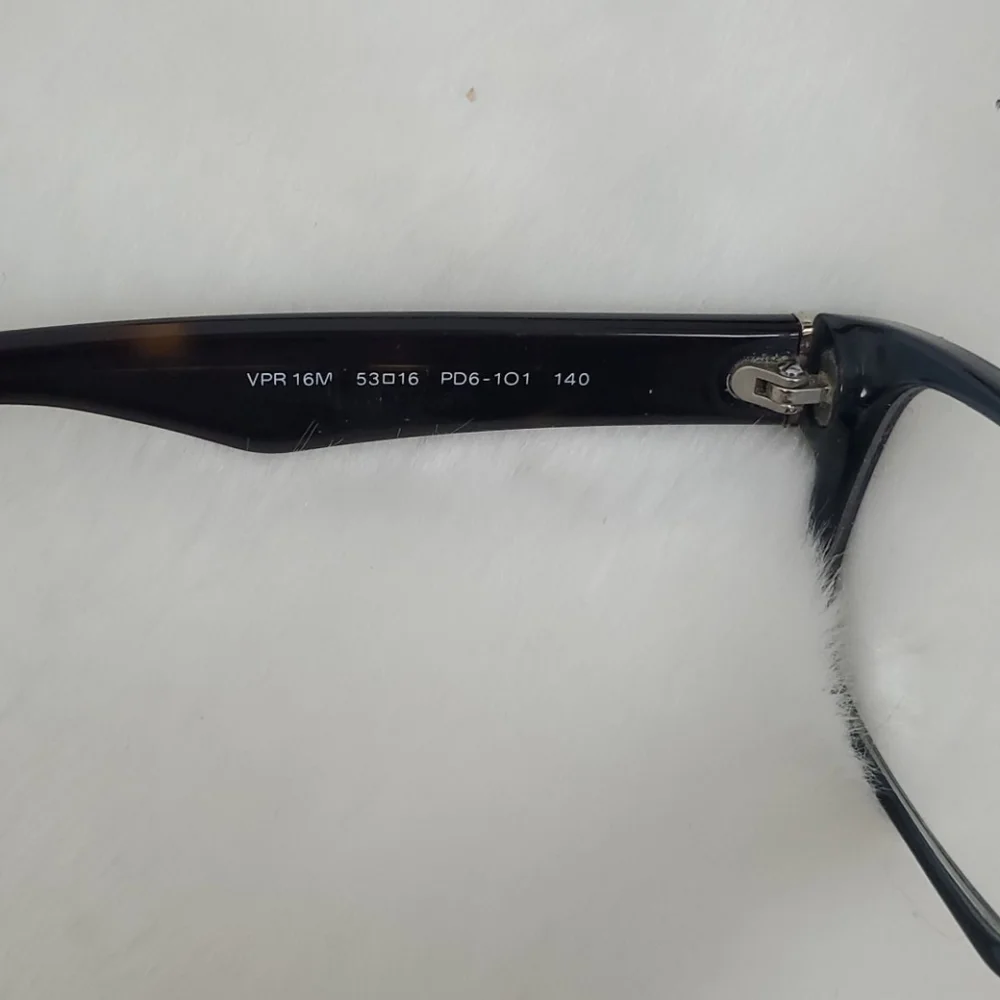 Prada used +2
